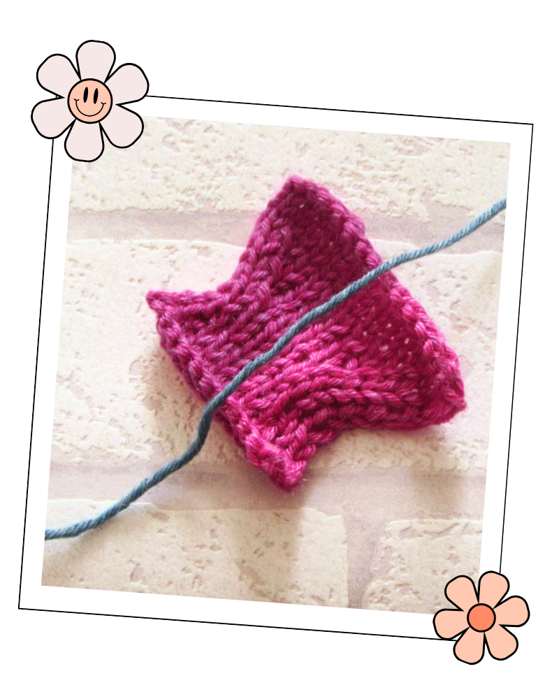 step two of step by step Knitted butterfly tutorial easy butterfly knitting pattern jane burns