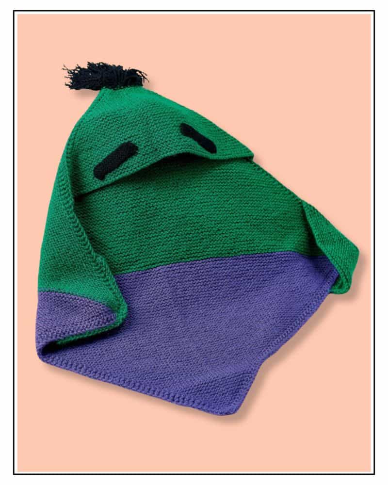 Frankenstein Monster Baby Blanket Knitting Pattern: Free 4 Frankenstein monster hooded baby blanket knitting pattern, green and purple garter stitch with black eyebrows and hair tuft - frankenstein monster baby blanket knitting pattern