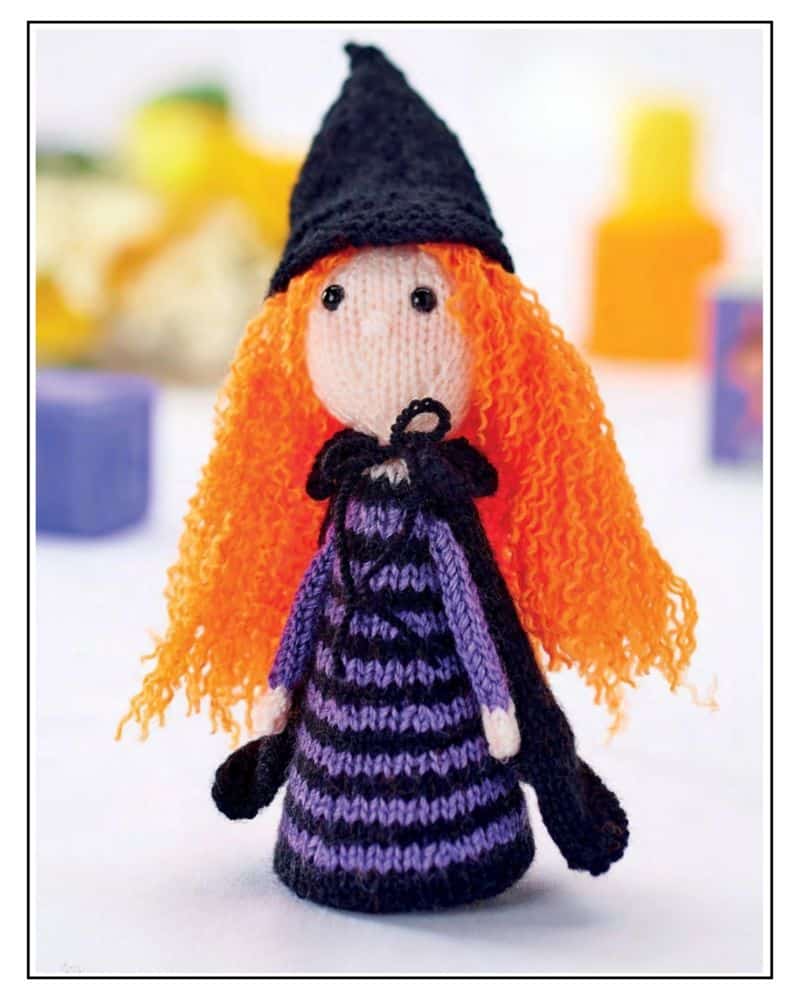 Free halloween witch toy knitting pattern for beginners. Meet Monica the Witch, a knitted toy in DK yarn with a striped body, pointed hat, and very orange hair. Quick to knit up and lovely as a Halloween gift or decoration.