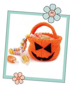 knitted halloween pumpkin bag with sweets, free trick or treat bag knitting pattern for children